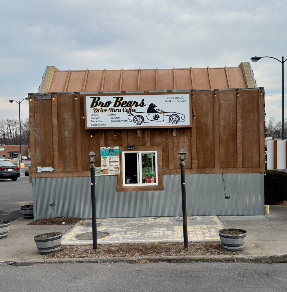 Front exterior of Bro Bears Drive-Thru Coffee stand with service window and signage, featured in the Bro Bears Drive-Thru Coffee Shop Review.