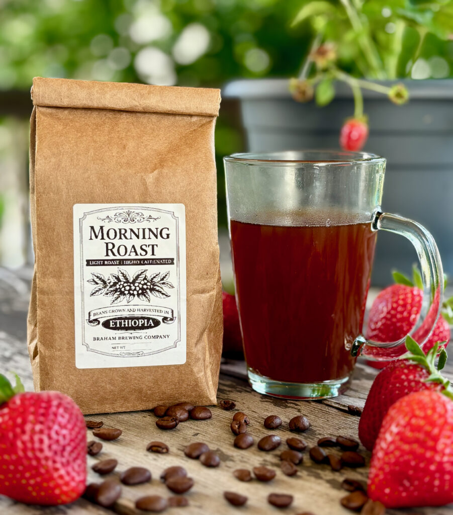 Braham Brewing Morning Roast Ethiopian Coffee Review bag with brewed coffee, coffee beans, and strawberries